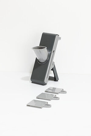 Multi-purpose mandoline with pusher