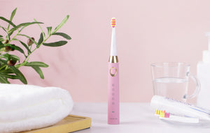 Periuță de dinți electrică cu ultrasunete FairyWill FW-508 cu 8 rezerve și husă, roz