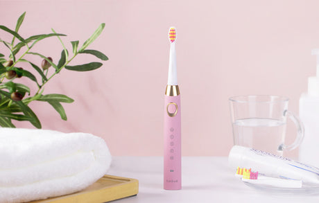 Periuță de dinți electrică cu ultrasunete FairyWill FW-508 cu 8 rezerve și husă, roz