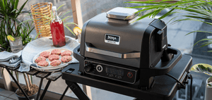 Grătar electric Ninja Woodfire OG701EU cu afumătoare, 2400W, 7 funcții de gătit, gri