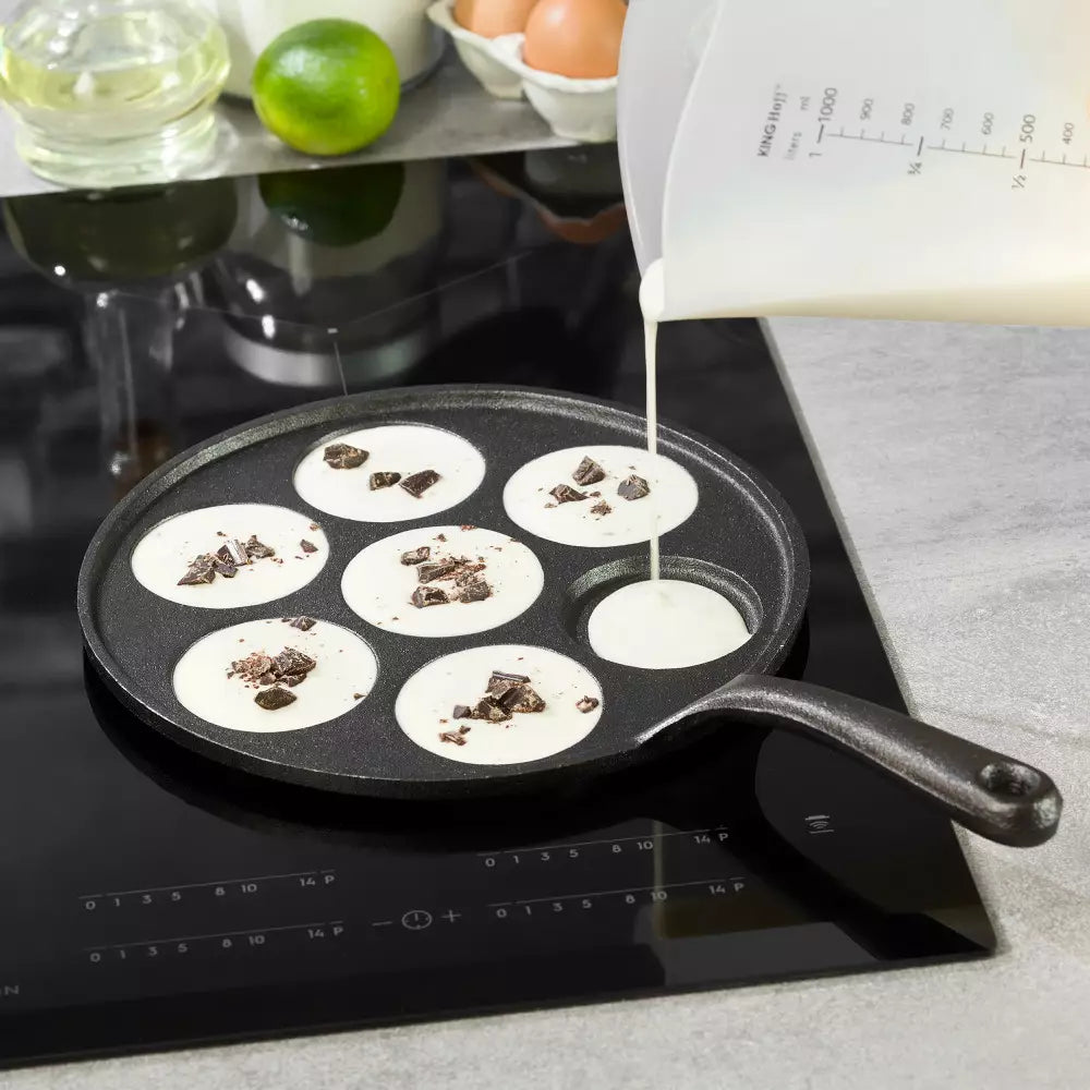 KingHoff 1263 Tigaie pentru clătite mini, 23 cm, 7 compartimente, Fontă, Negru